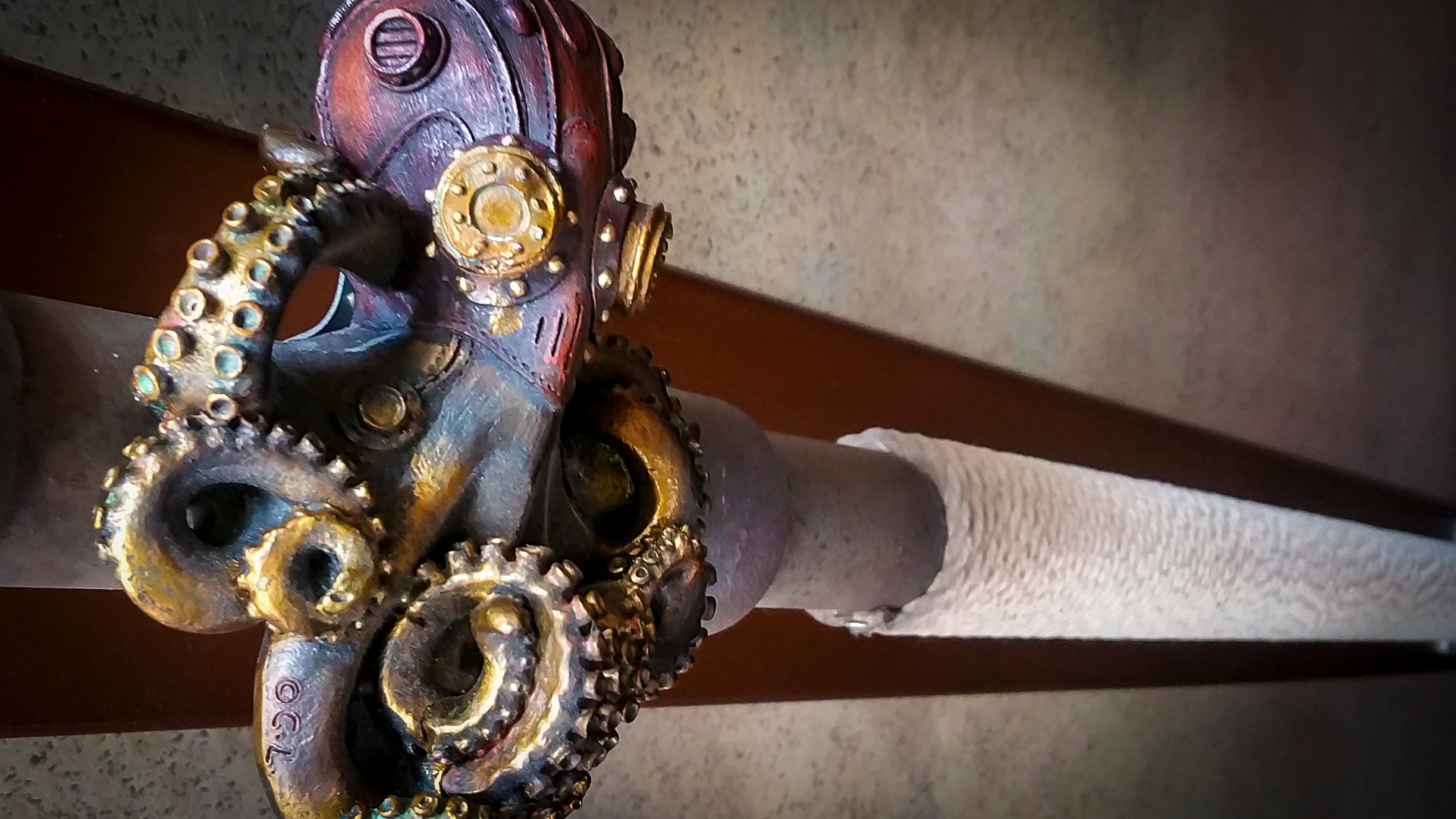 handrail wrapped with rope and octopus ornament