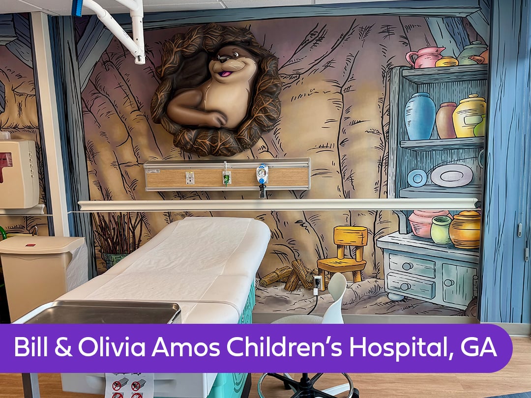 Pediatric exam room with themed mural and 3D character wall design creating a child-friendly healthcare environment at children’s hospital in Georgia by Wacky World Studios