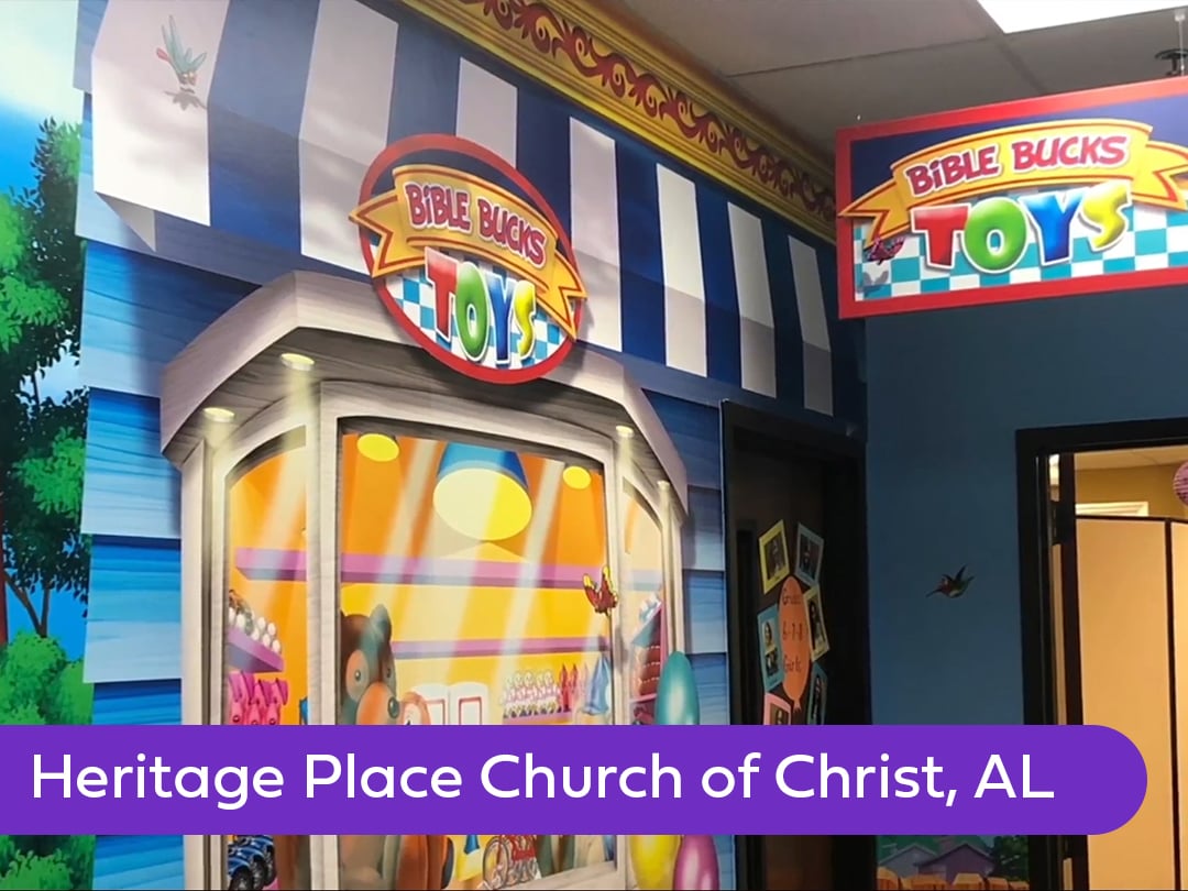 Custom toy store-themed façade at Heritage Place Church of Christ featuring dimensional signage, storefront graphics, and immersive neighborhood-inspired children's ministry design.