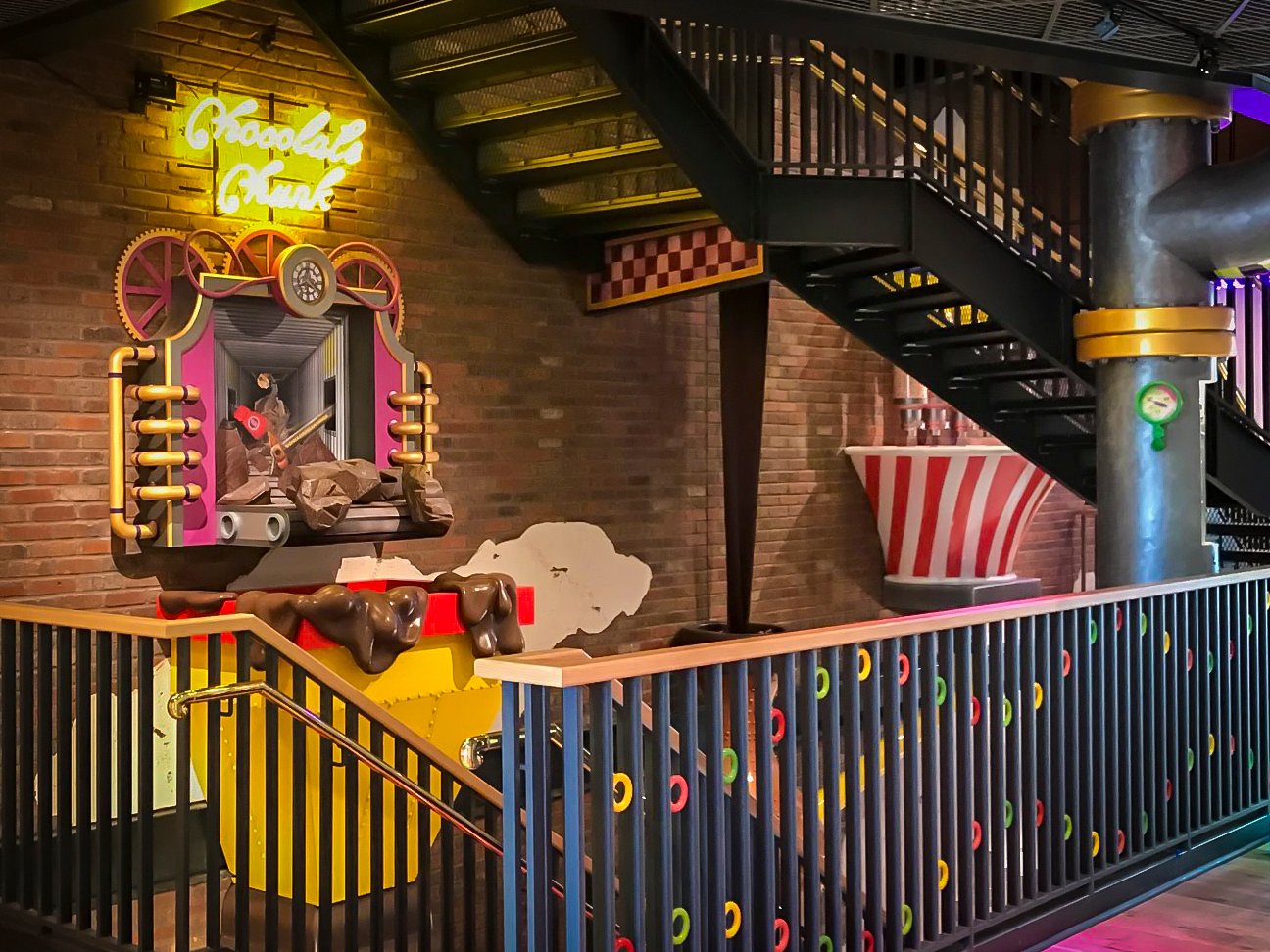 Immersive chocolate factory-themed workplace at Epic Systems showing how experience-driven design enhances corporate environments and employee engagement.