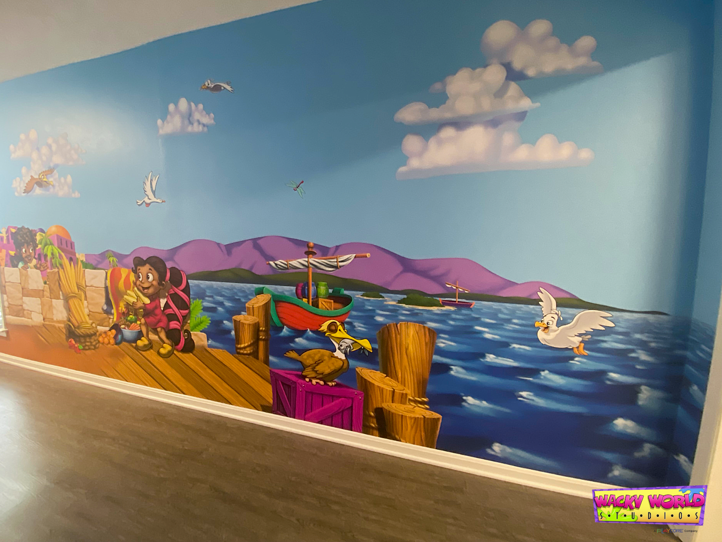 Biblical harbor mural featuring boats, docks, and village life in a church children's ministry environment
