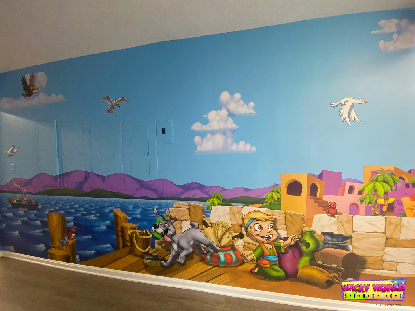 Bible-themed waterfront mural creating an immersive biblical village atmosphere for children's ministry