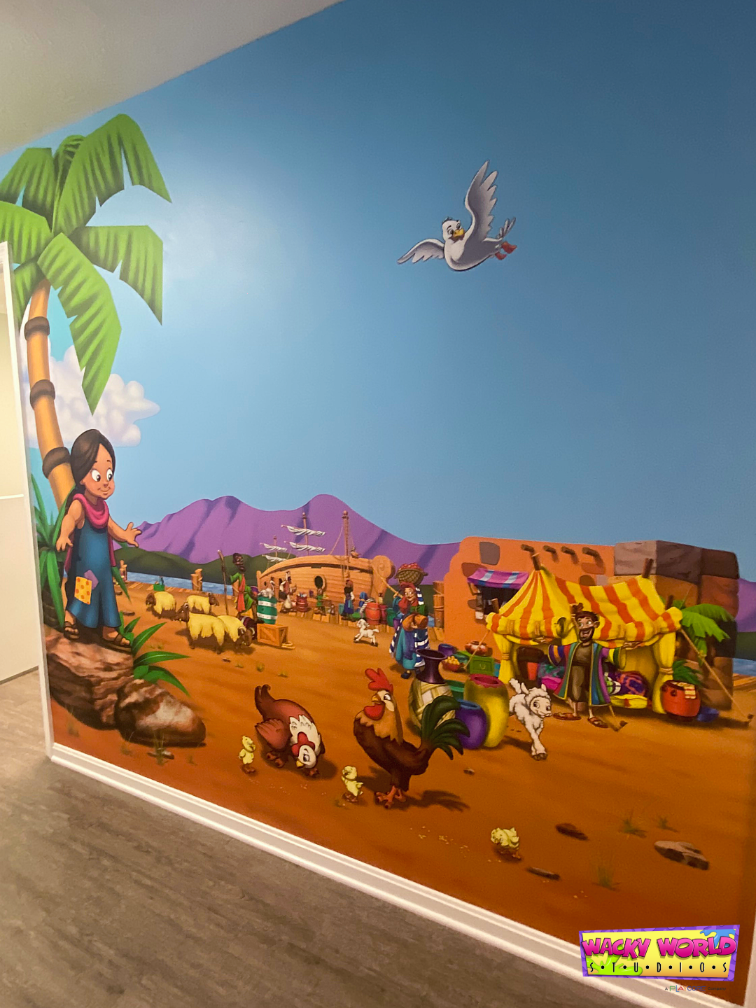 Children's ministry hallway transformed with Bible-times marketplace murals and environmental graphics