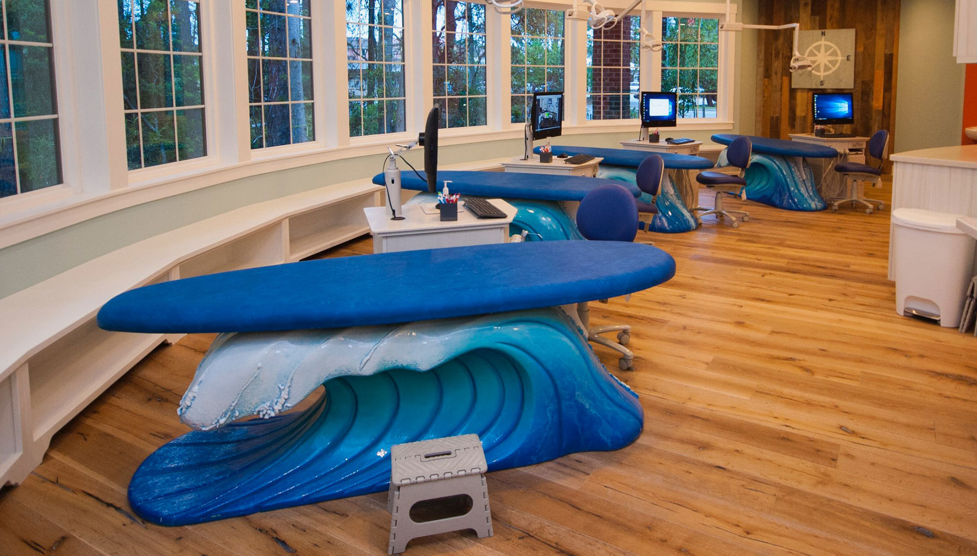 3D Wave and blue Surfboard medical exam tables