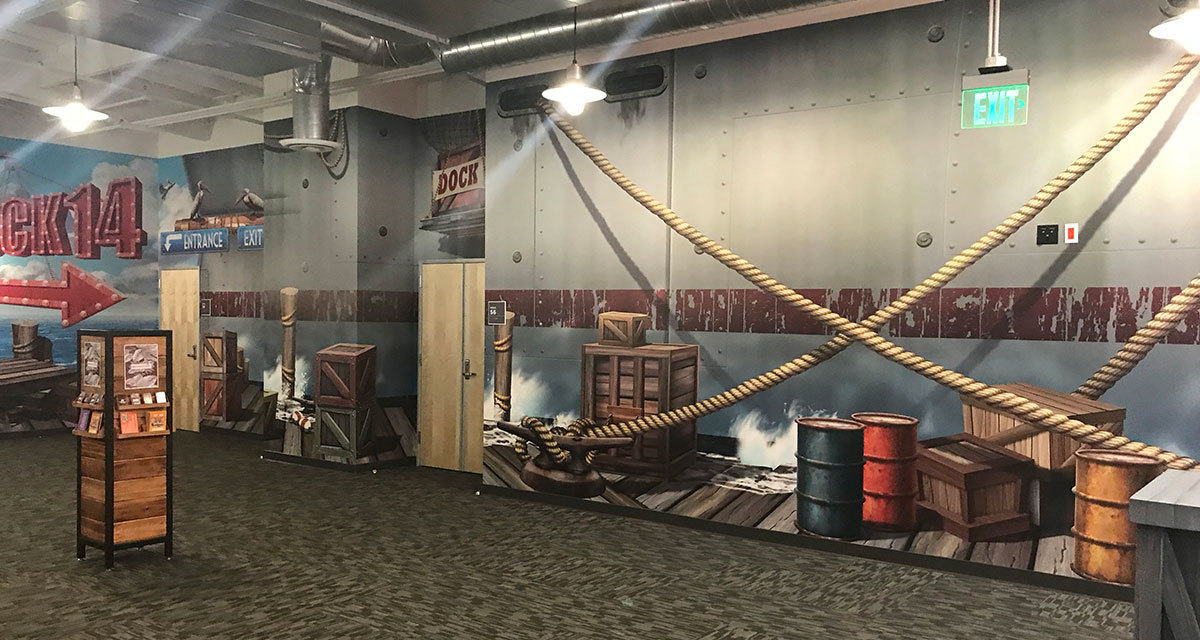 Shipping Dock Themed Wall Covering with giant ship, ropes, barrels, crates and dock at Crosspointe Anaheim