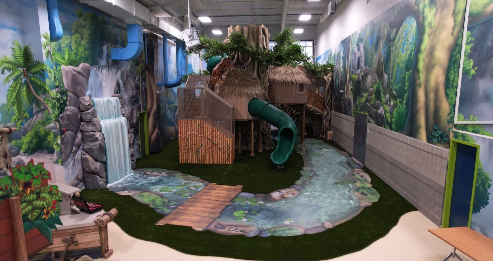 Animated Waterfall and River plus Treehouses and slides at West Chicago Park District Treetop Escape at the ARC Center