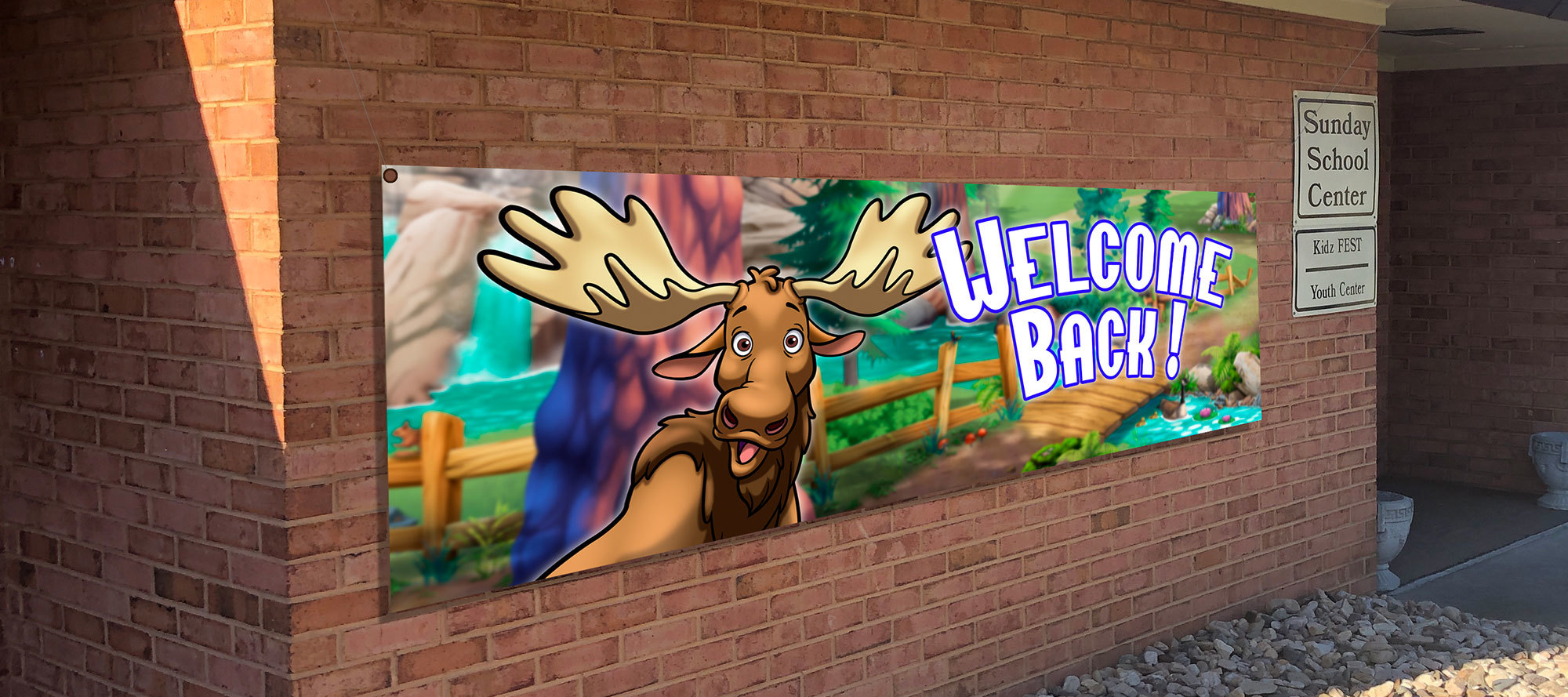 Welcome Back Outdoor Banner with cartoon moose in a forest