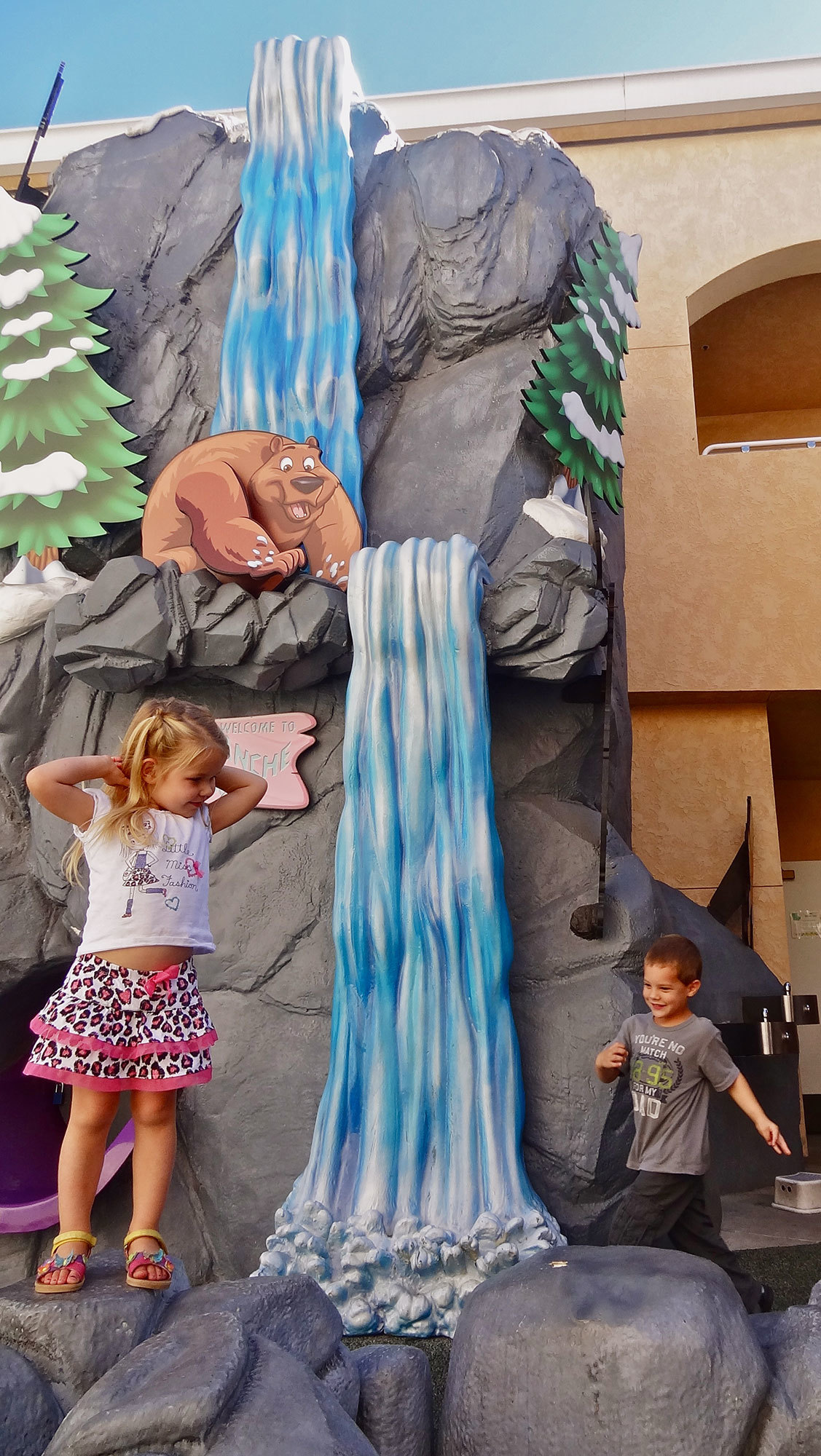 Kids Playing on Waterfall and Mountain Sculpted Play Area at Shadow Mountain Church