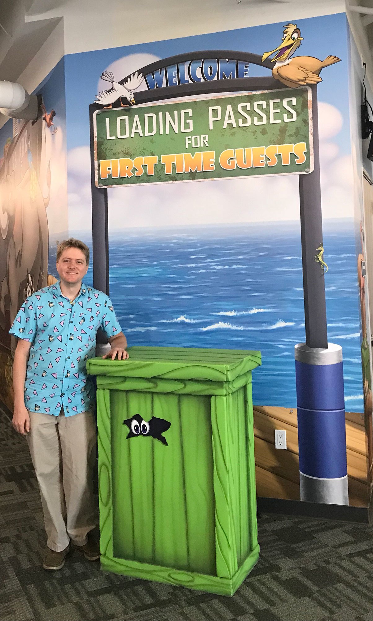 Steven Walker with a Noah's Ark Shipping Dock Themed Check in Desk and Wall Covering at Crosspoint Anaheim