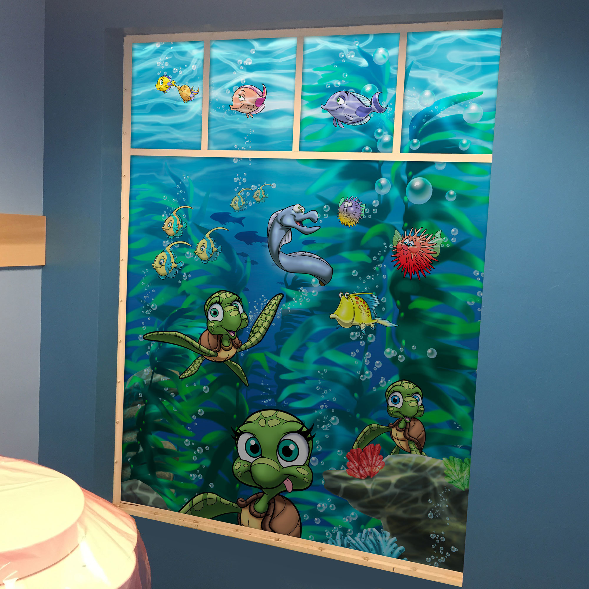 Window graphic showing undersea plants, turtles, fish and an eel in an Undersea Themed space at Gulfshore Pediatric Dentistry