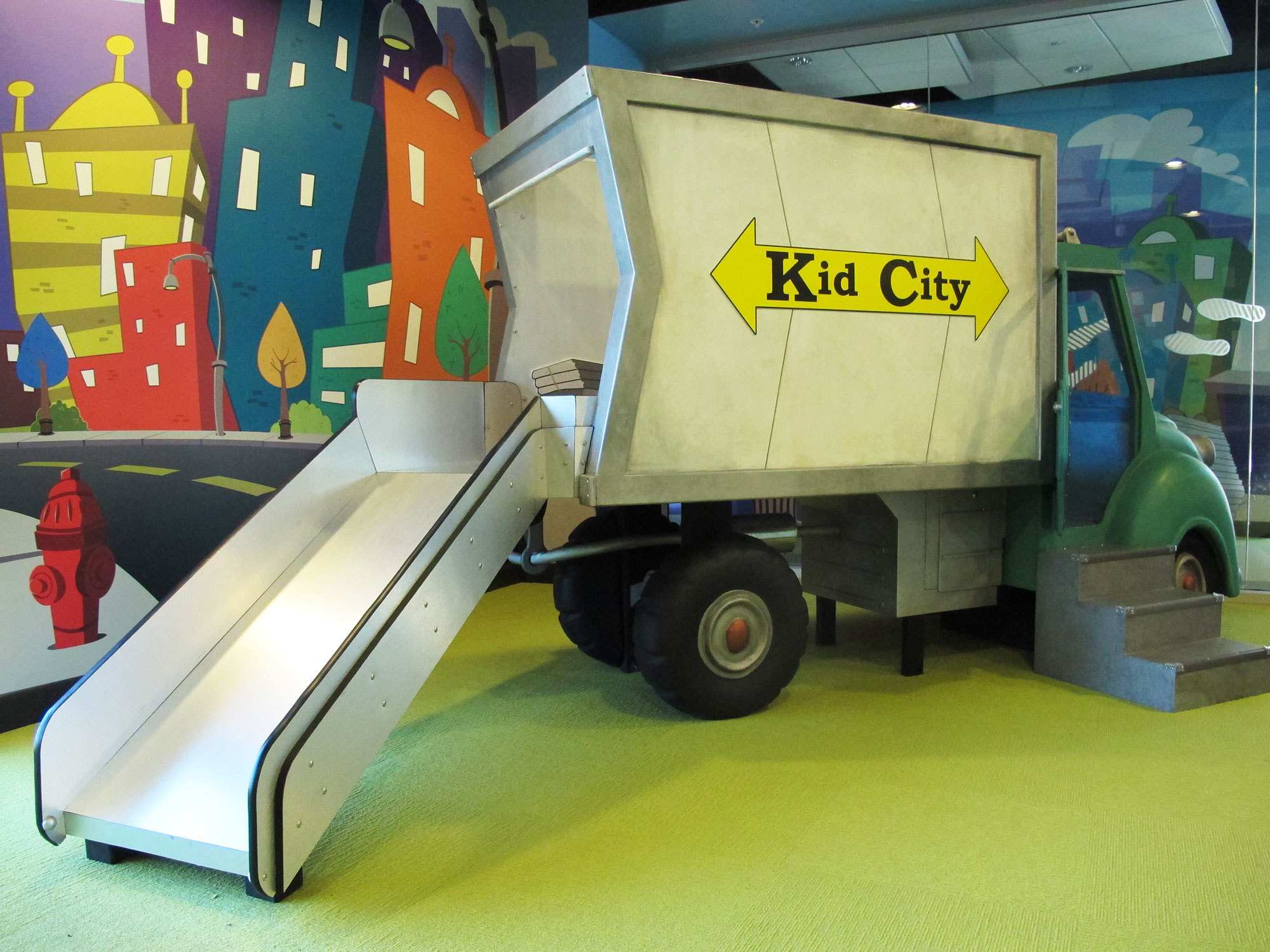 Kid City Big City Truck Themed Slide in Toon Town Themed Space at Mount of Olives Church