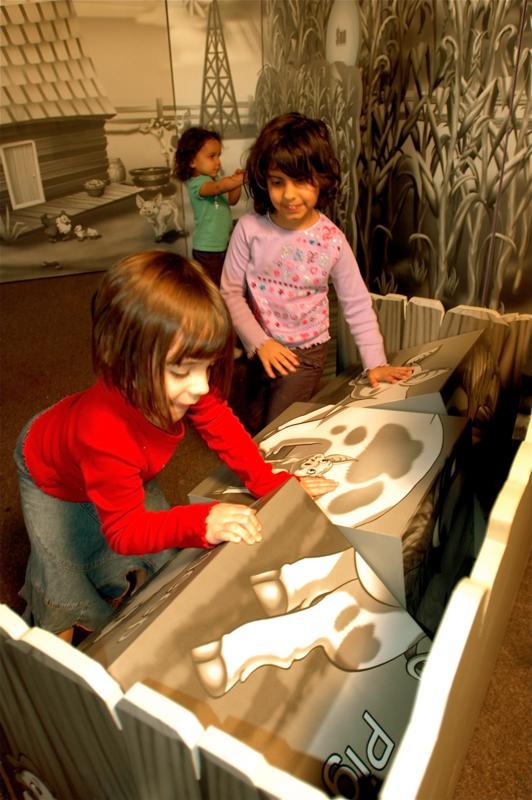 Kids playing at Wizard of Oz themed environment