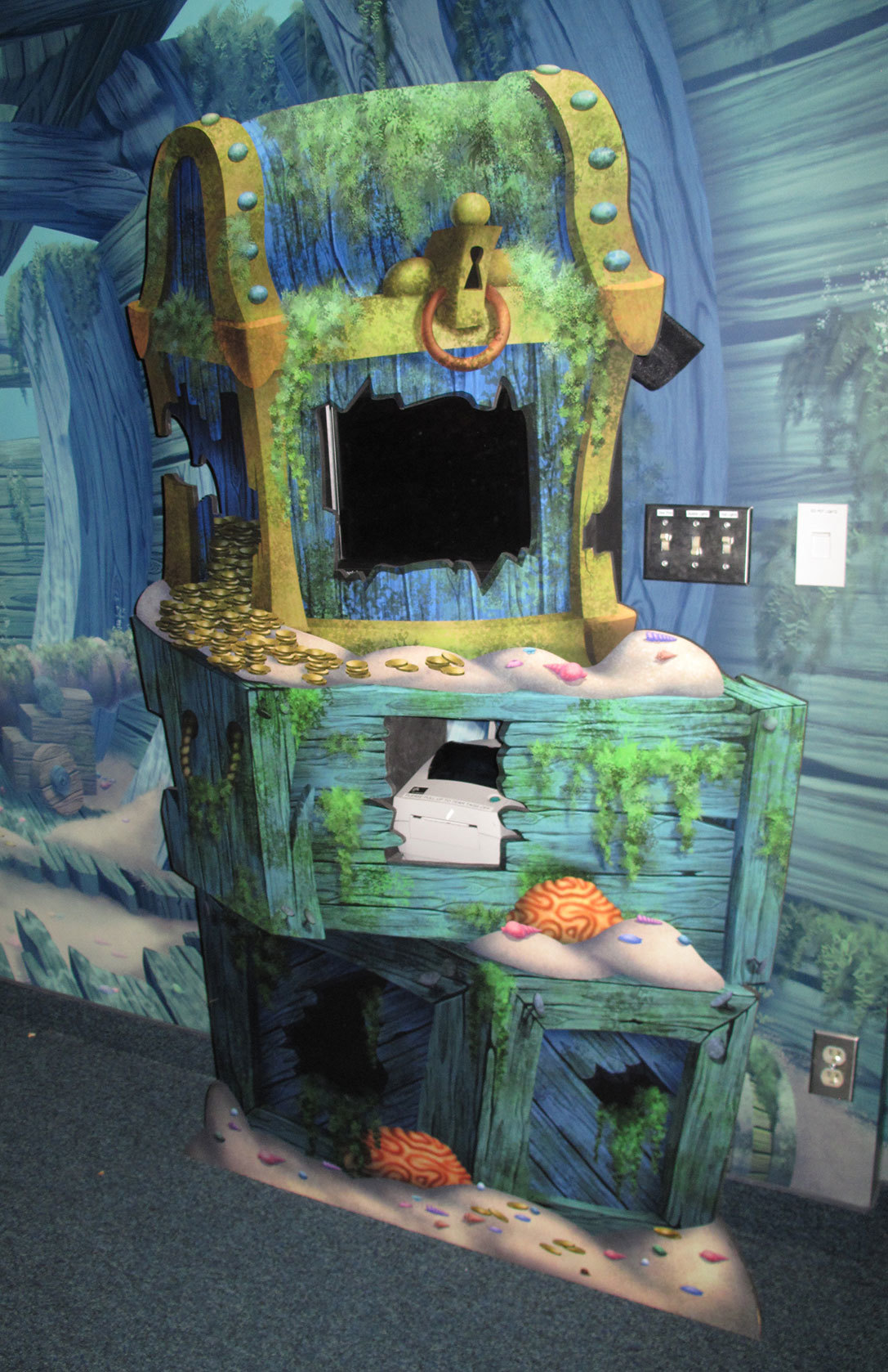 Undersea Themed 2D cutout treasure chest as a check-In Kiosk